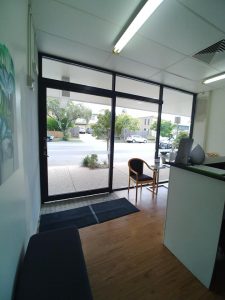 Brand new frontage from inside Dental Excel Bracken Ridge before window decals